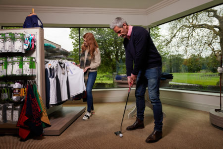 Couple In Golf Shop Image 1