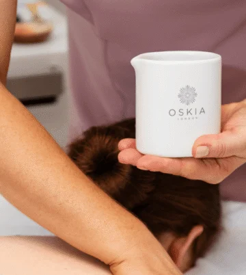 Luxurious spa treatment with massage oil at elegant hotel spa, promising relaxation and rejuvenation.