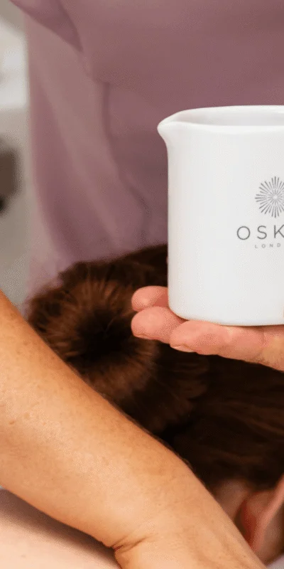 Luxurious spa treatment with massage oil at elegant hotel spa, promising relaxation and rejuvenation.